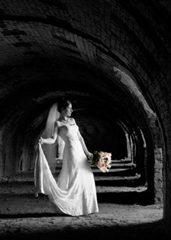 bride with finch curled hair and natural warm toned makeup